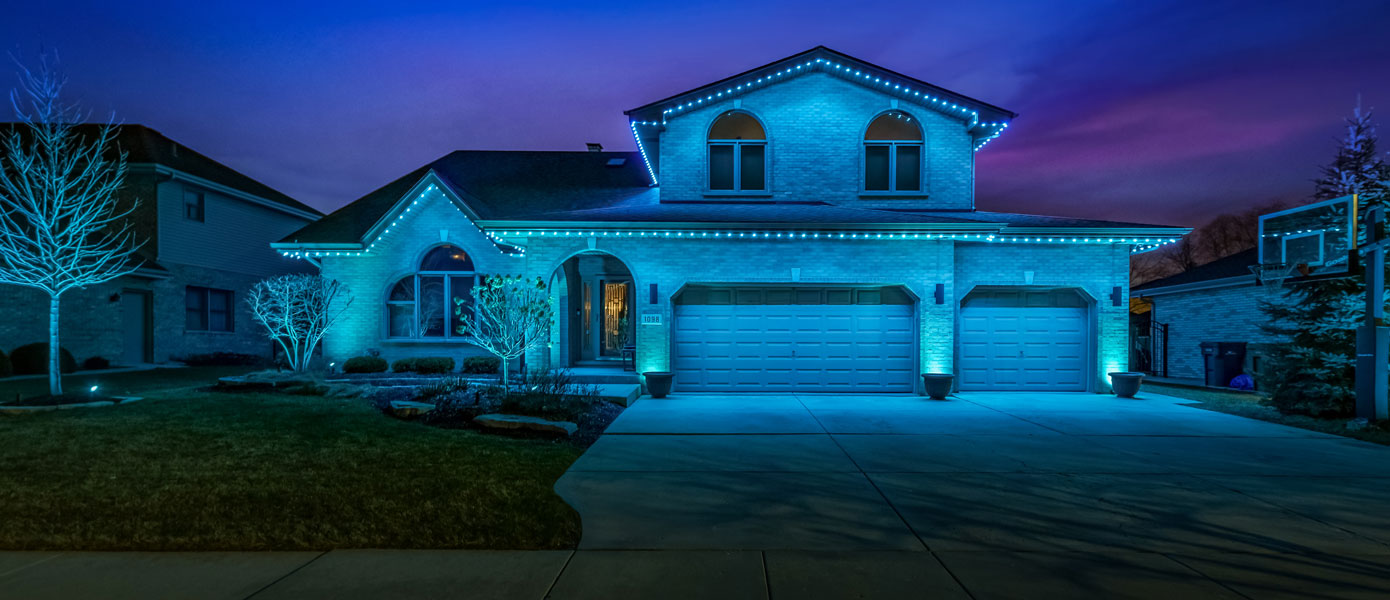 House with permanent roofline lighting
